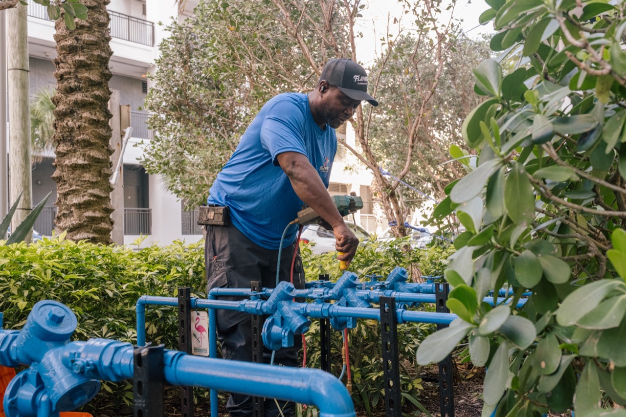 Flamingo technician testing a commercial backflow assembly in Fort Lauderdale